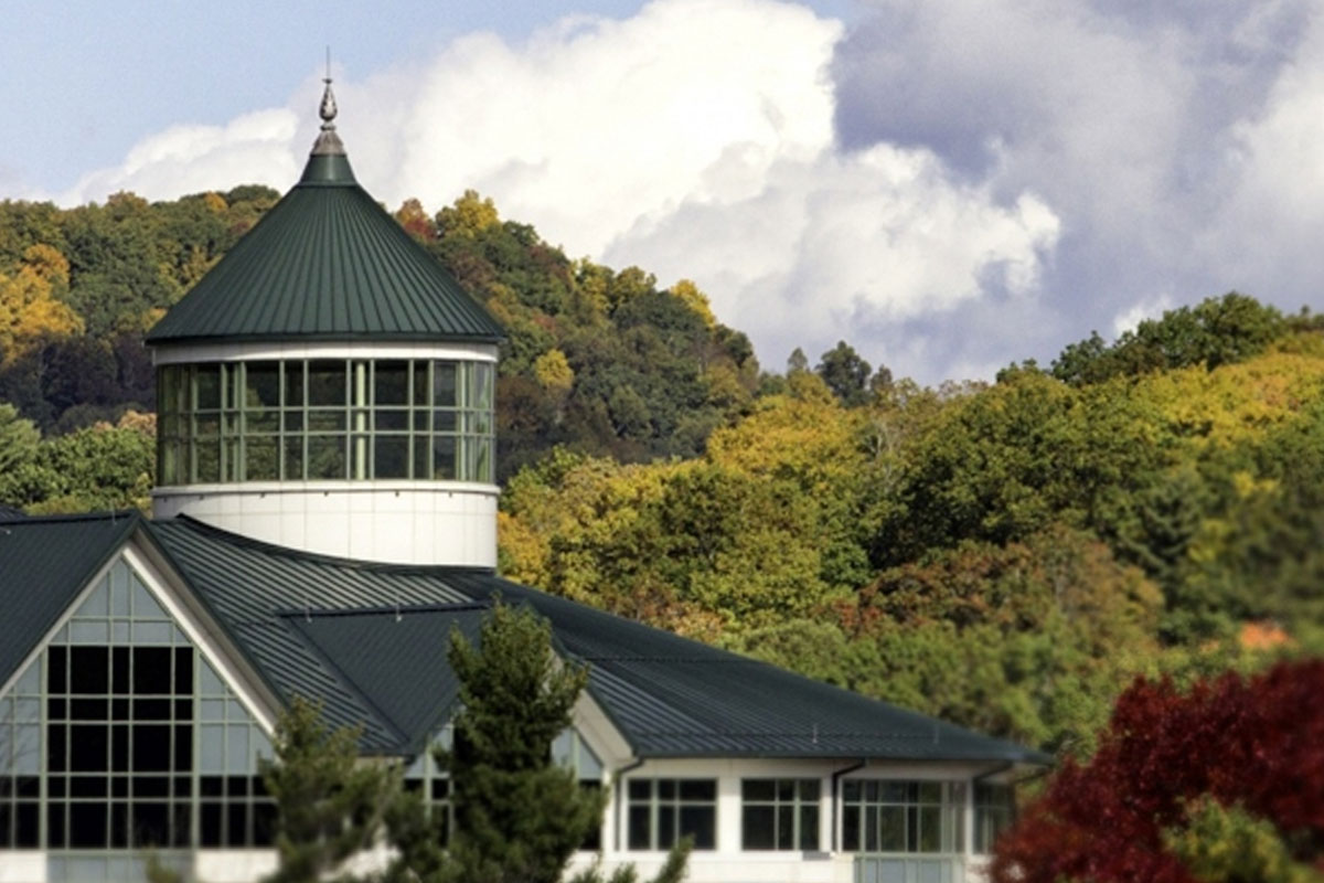 This image shows the top of Belk Library & Information Commons at the beginning of fall.