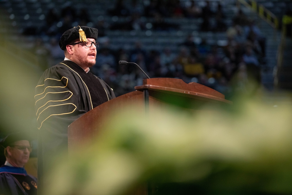 JuanEs speaking at commencement