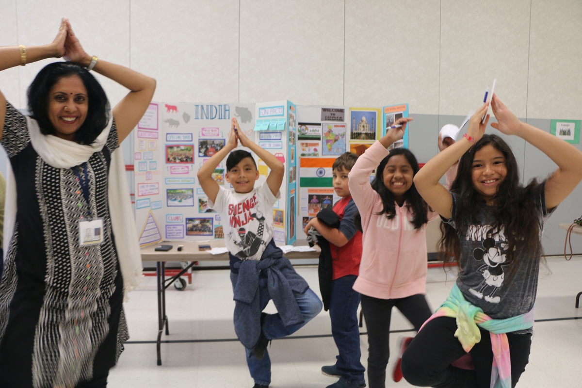 Students learning yoga