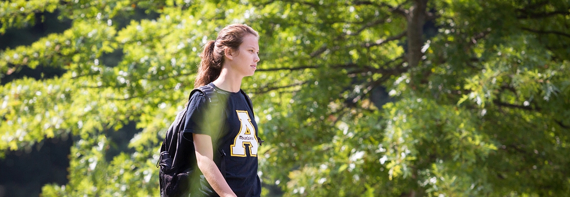 Girl walking on campus