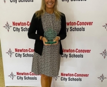 Carla May with award