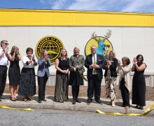 The ribbon is cut to celebrate the opening of the App State Academy at Elkin.