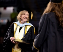 Dean Spooner congratulates graduate