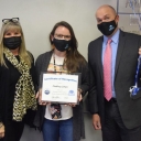 Audrey Jones accepts her award from Superintendent Scott Elliott and Parkway Principal Patty Buckner. Photo submitted