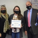 Audrey Jones accepts her award from Superintendent Scott Elliott and Parkway Principal Patty Buckner.  Photo submitted