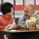 Eric Groce, professor of education at Appalachian State, talks with Middle Fork Elementary School third-grader Joanna Meng.