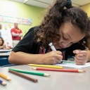 Six-year-old Keeley Neely colors at her desk inside Hardin Park Elementary in Boone, N.C., on Thursday, Oct. 10, 2024.