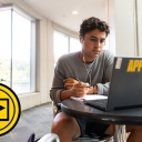 Zach Covington, a first-year exercise science major at Appalachian, looks at his laptop while taking notes