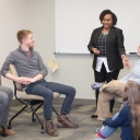 Dominique Hammonds talking with students