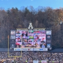 Mountaineer Readers on the Jumbotron waving