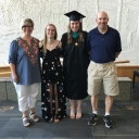 Marie (far left) with her family at her daughter’s MPA hooding ceremony. 