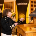 Dean Melba Spooner ringing the bell