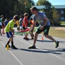 Boys participate in a challenge during the Xcel2Fitness after-school program designed by Stephen Vaughn ’05, who 