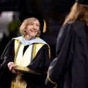 Dean Spooner congratulates graduate