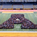 Appalachian students gather with Chancellor Sheri N. Everts to form the traditional “Block A”