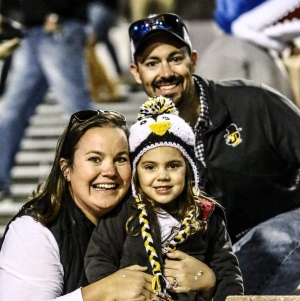 Cameron Ammann '06 with her husband, Ryan, and daughter, Haddie. Photo submitted