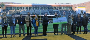 Watauga County Teachers and Principal of the Year being recognized on field