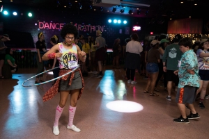 A participant in the 2018 Dance Marathon at Appalachian incorporates hula-hooping into her dancing. Photo by Chase Reynolds