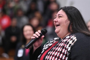 Meghan LeFevers, sole 2017-18 Milken Educator Award recipient from North Carolina, addresses an assembly of students, staff and guests gathered in her honor within Bessemer City High School’s gymnasium. Photo courtesy of Milken Educator Awards