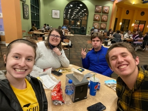 Sydney McKeaver, far left in foreground, is an App State senior majoring in elementary education with a secondary concentration in exceptional learners. She serves as a College Life Fellow for App State’s Scholars with Diverse Abilities Program (SDAP), helping the scholars with daily tasks. Pictured with McKeaver, from left to right, are SDAP scholars Anne Carol Sheely, Bridger Robinson and Web English.