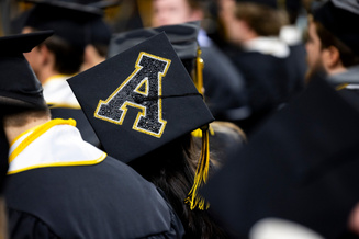 Grad cap with "A" bedazzled on the top