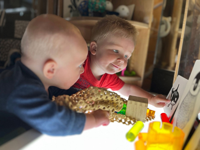 Children engaged in educational play at the Lucy Brock Child Development Laboratory program in Boone, NC.
