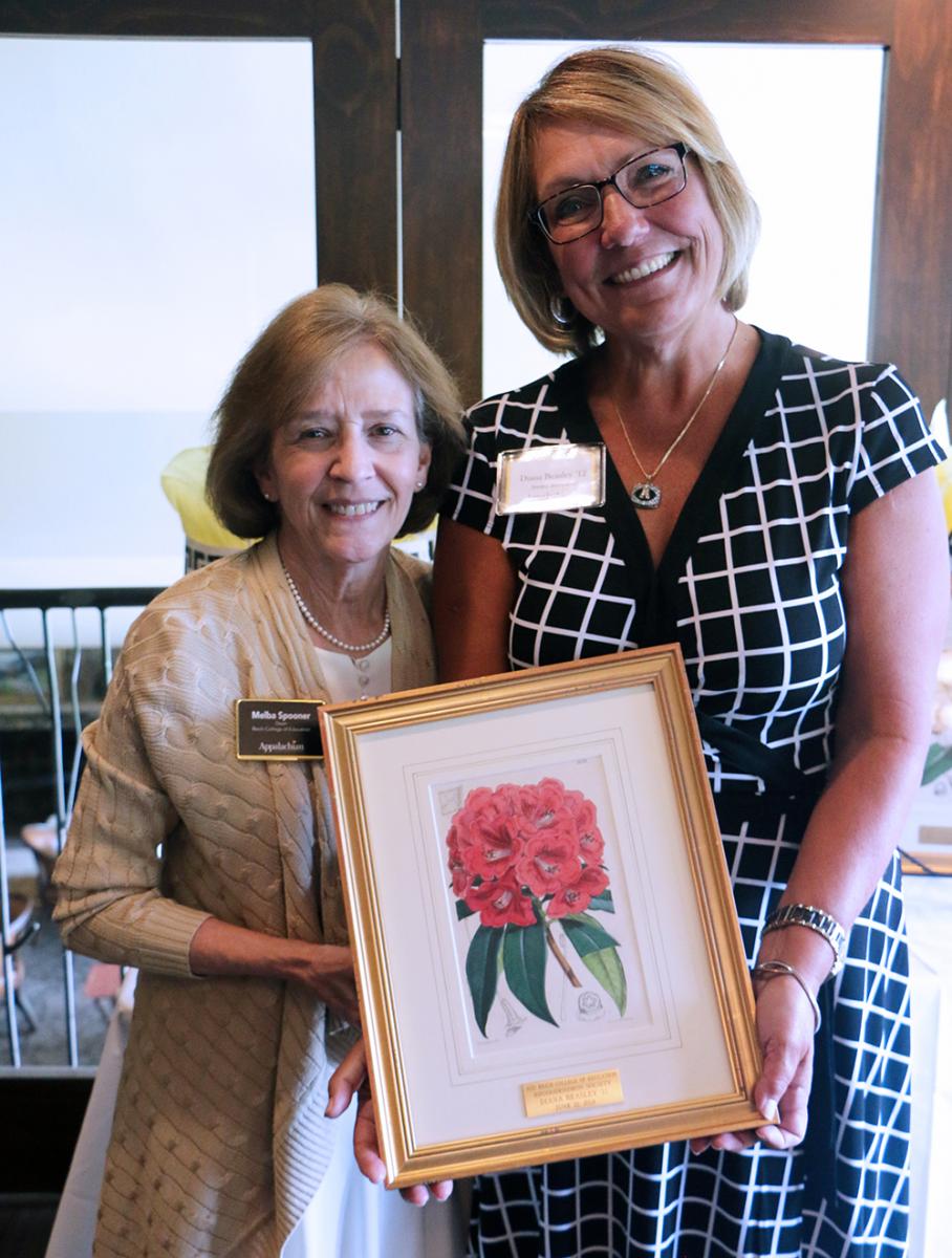 Diana Beasley (right) with RCOE Dean Melba Spooner (left).