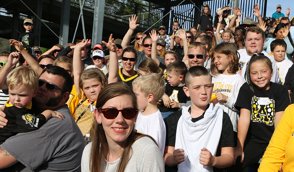 Mountaineer Readers and guests at the game