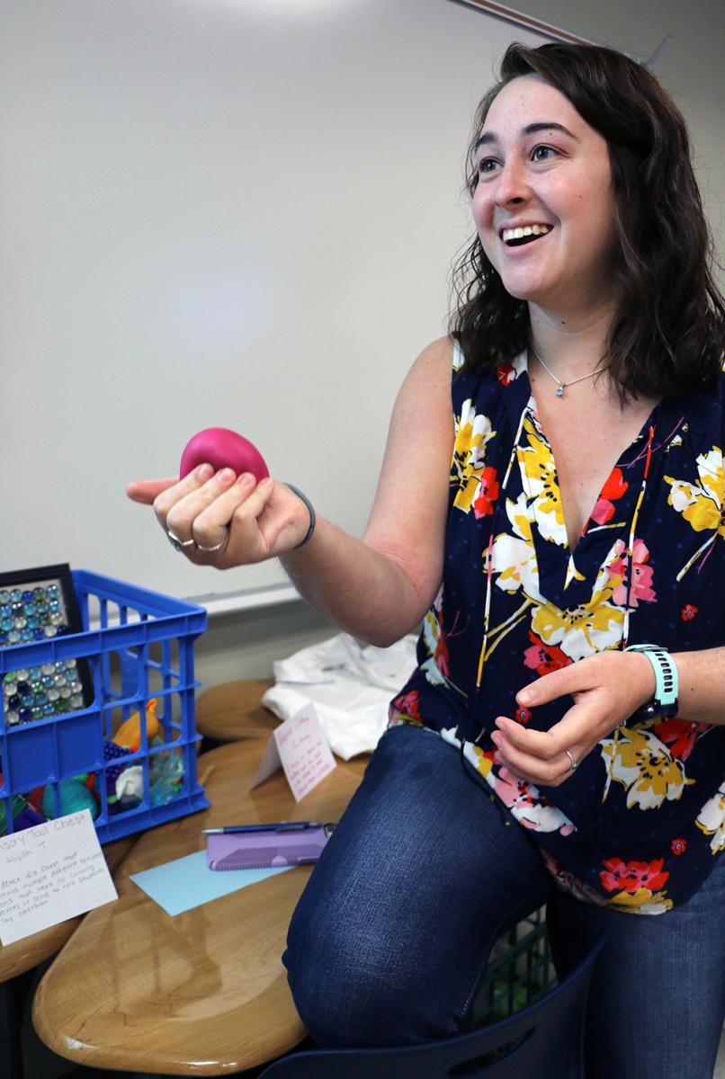 Aliyah T. holds one of the sensory items from her Sensory Tool Chest.