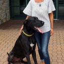 Karla with her dog, Sydney. Sydney is a registered therapy dog.