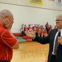 Hendersonville Middle's Luke Manuel is surprised with the Principal of the Year award this afternoon by Superintendent Bo Caldwell during a pep rally at the school.