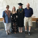 Marie (far left) with her family at her daughter’s MPA hooding ceremony.