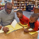 Derrick Barnes signs books
