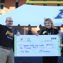 Teachers and Chancellor with the Check