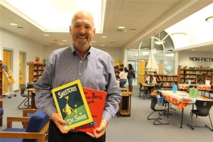 Eric Groce, a Professor of Elementary Education at Appalachian State University, read to students at Middle Fork Elementary School.